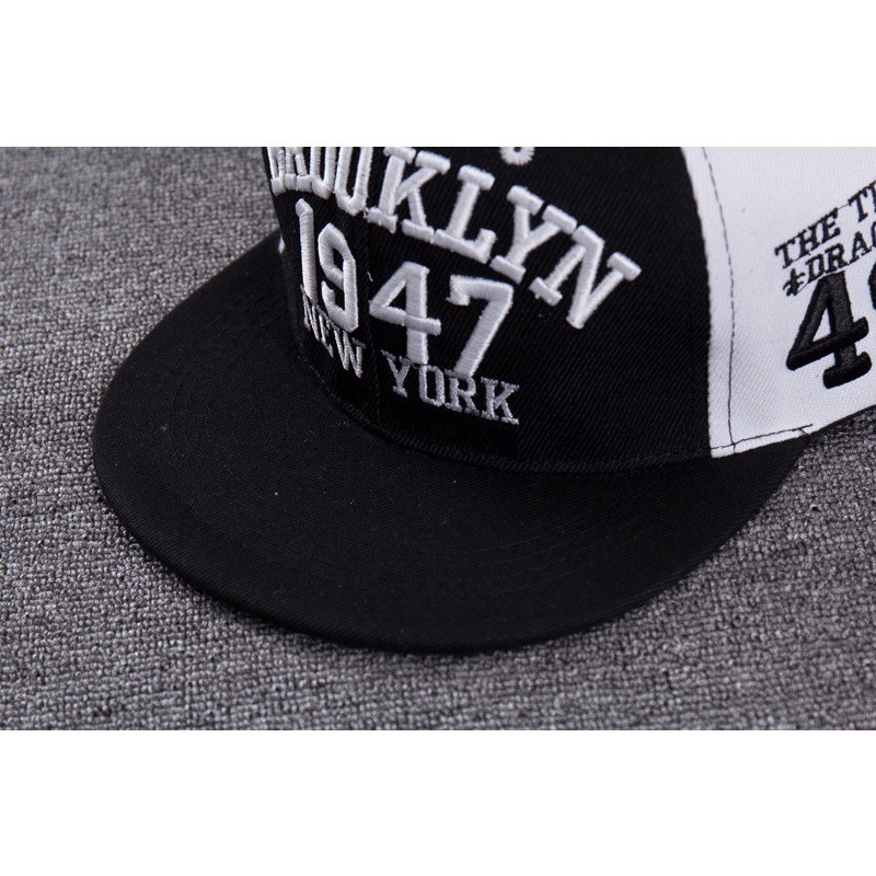 Mũ lưỡi trai nam nữ cho bé trai bé gái nón kết unisex phối đen trắng mã M1947