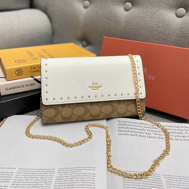 Túi - ví cầm tay viền đinh