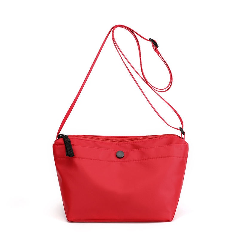 Túi Đeo Chéo Vai Hình Bánh Bao Thời Trang Bằng Vải Canvas Phối Nylon Phong Cách Thể Thao Hợp Xu Hướng Dành Cho Bạn Nữ