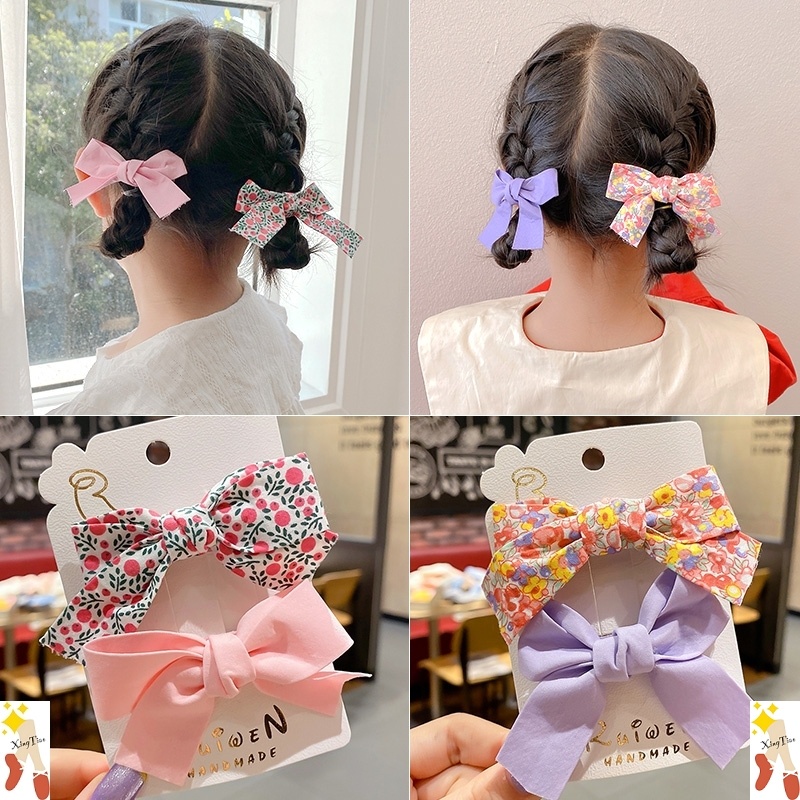 Bộ 2 Kẹp Tóc Đính Nơ Xinh Xắn Dành Cho Nữ