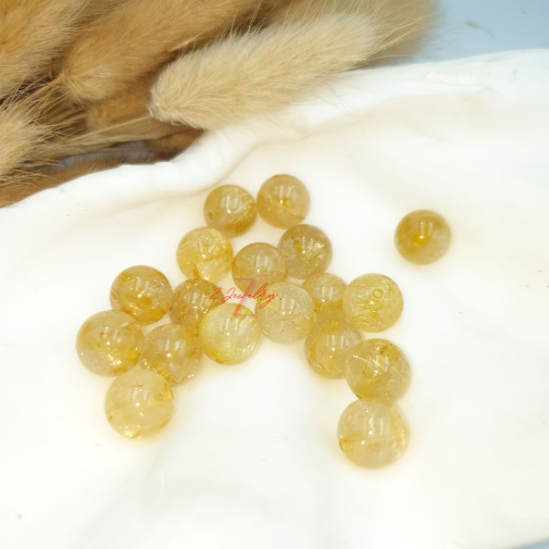 1 hạt đá tóc màu vàng