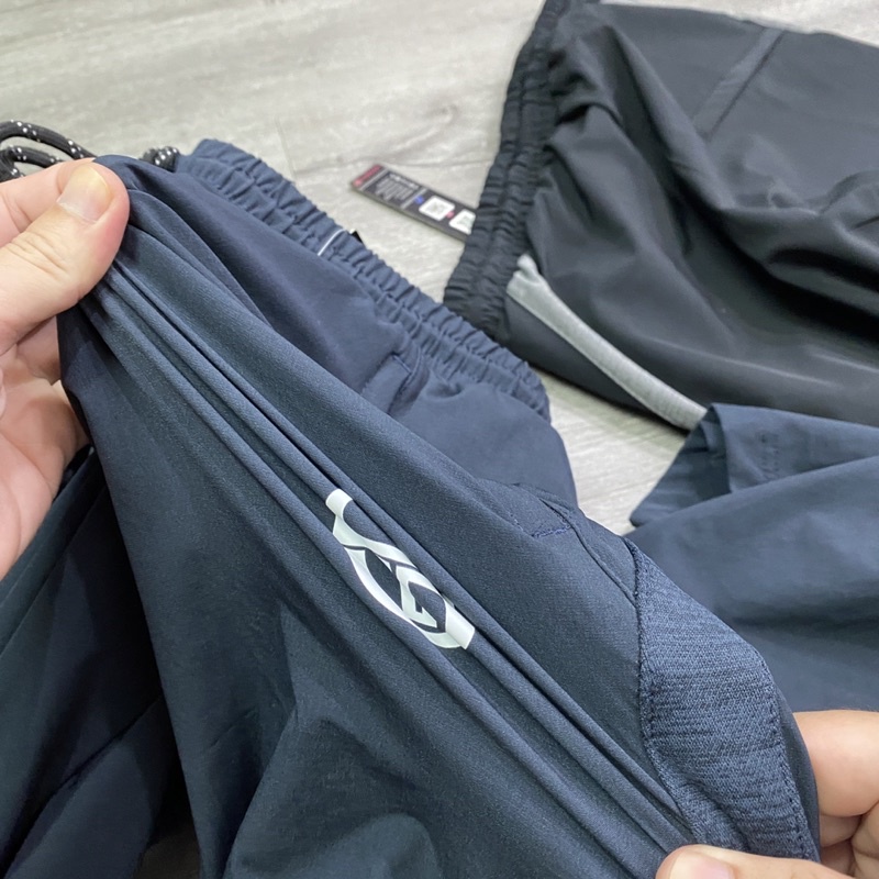 Quần gió xuất dư không nhăn/co giãn/chống nước nhẹ