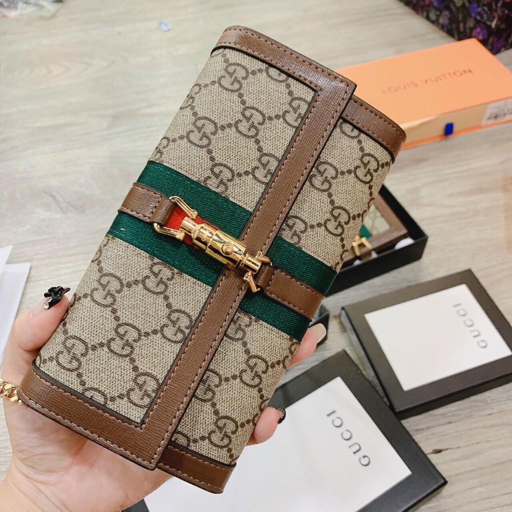 Ví cầm tay Gucci/Clutch cầm tay