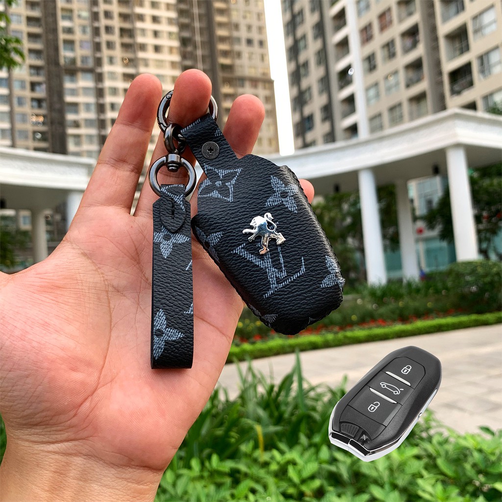 Đựng smartkey Peugeot 2008 3008 5008 Handmade da thật PEV AD có tay cầm