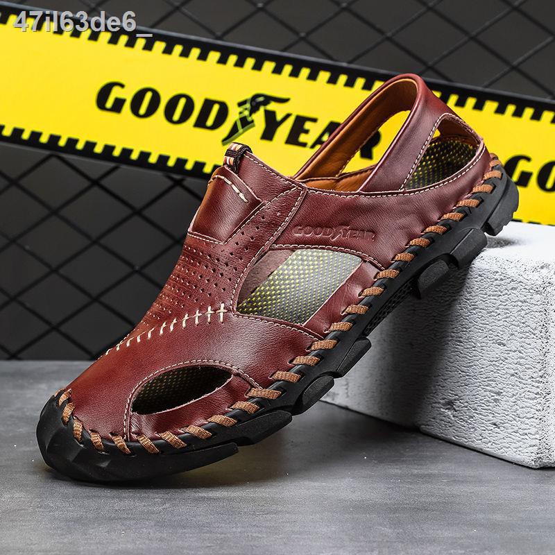 ✸●Dép Goodyear nam 2021 giày đi biển mùa hè mới lỗ xỏ ngón và trong nhà da bò thật chống trơn trượt khử mùi