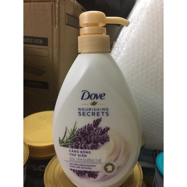Sữa Tắm Dưỡng Thể Căng Bóng Tươi Mới Dove Nourishing Secrets Với Dầu Trái Bơ &amp; Chiết Xuất Hoa Cúc Calendula 530g(527ml)