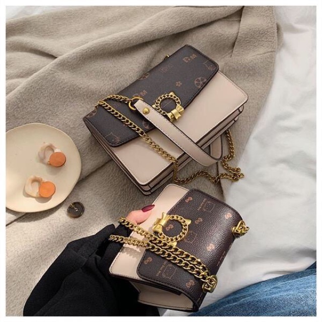 Túi da cao cấp khoá trong cá tính 586