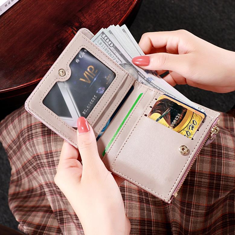 Ví mini cầm tay ánh nhũ có hình trái tim nhỏ