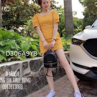 Đầm tay phồng in hoa phối nút
