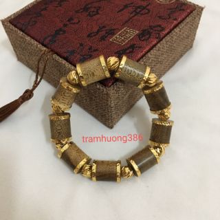Vòng tay trầm hương tốc tự nhiên bọc vàng size 12ly