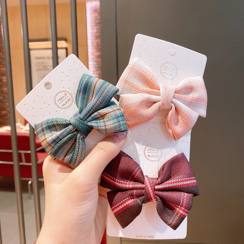 Kẹp tóc vải hình nơ xinh xắn dành cho bé gái