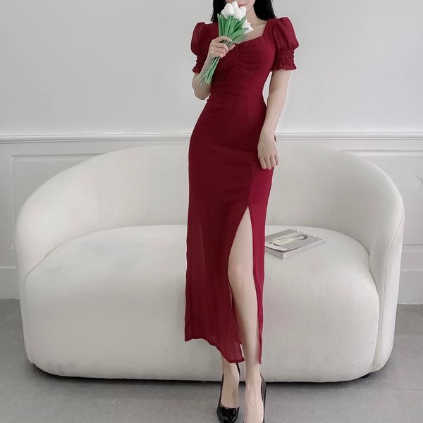 Đầm nhún ngực xẻ tà