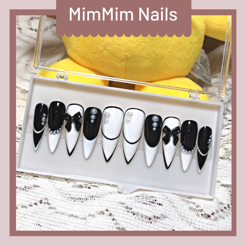 Nail box móng úp thiết kế đính nơ đen nữ tính xinh