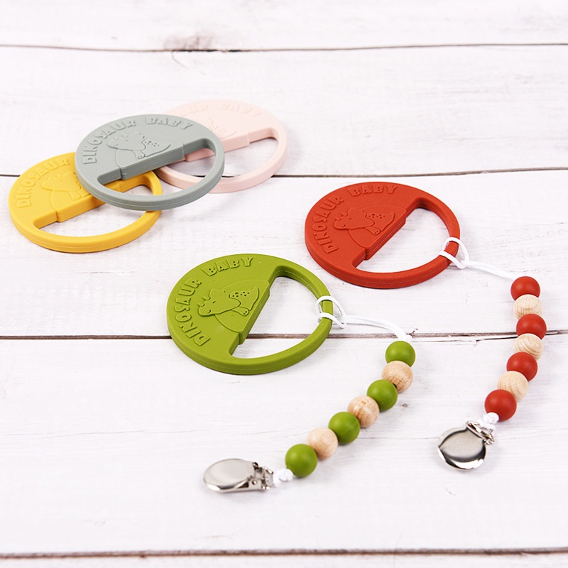 Vòng Tay Silicone Hình Khủng Long Đa Năng Cho Bé Ngậm Mọc Răng
