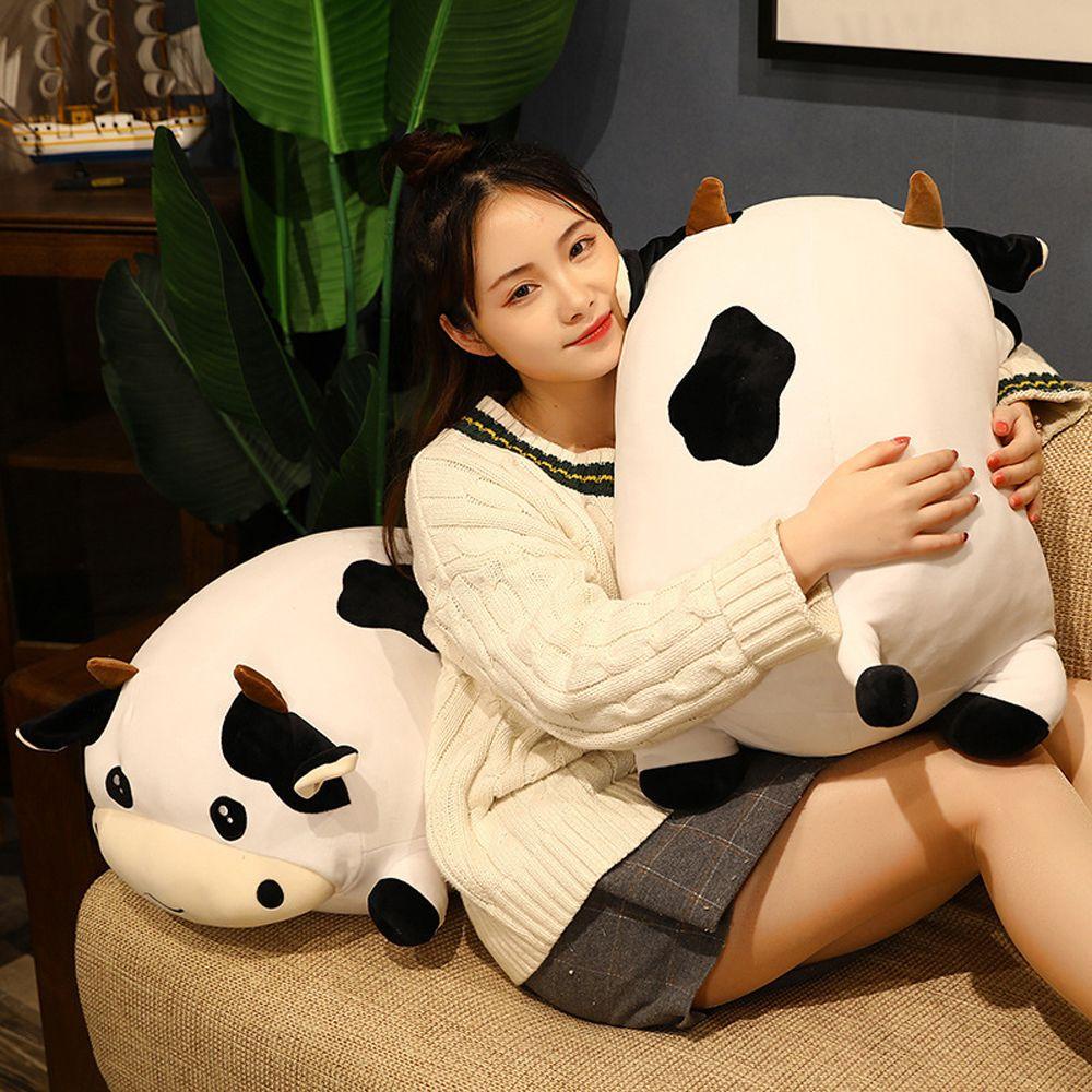 Đồ chơi nhồi bông Hình Bò Sữa Đang Nằm Mềm Mại Trang Trí Nhà Cửa