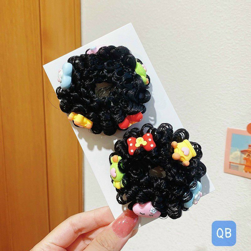 Dây búi tóc đính charm tạo kiểu cho bé.