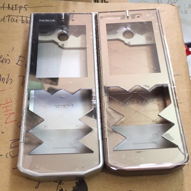 Vỏ nokia 7900 bạc có xương không phím hoặc có kèm phím đủ(hơi lỗi mặt kính phần chữ nokia)