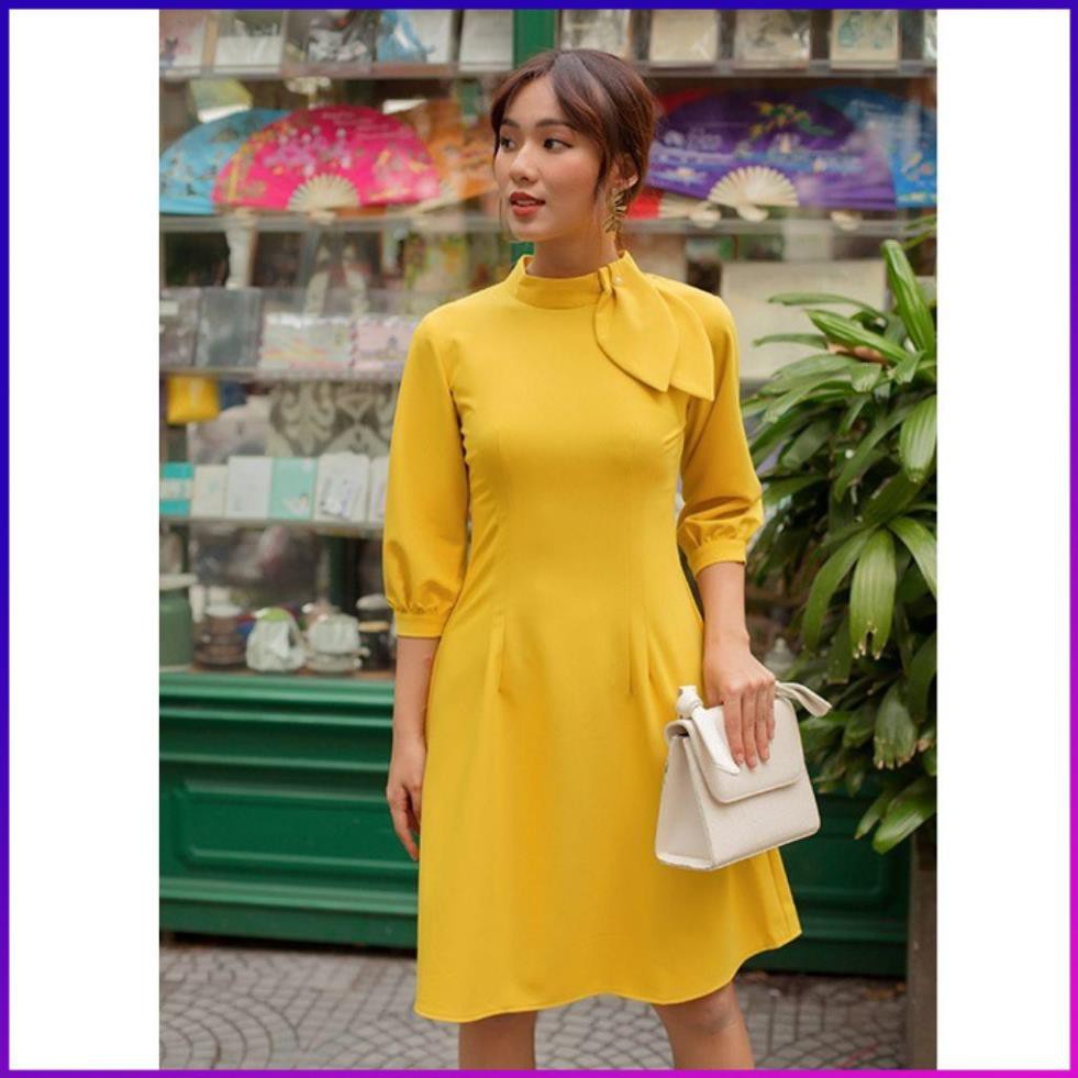 Váy Đầm Công Sở Nữ Tà A Cổ Nơ Tay Lở Dún Vải Dãn Nhẹ Màu Vàng | BigBuy360 - bigbuy360.vn