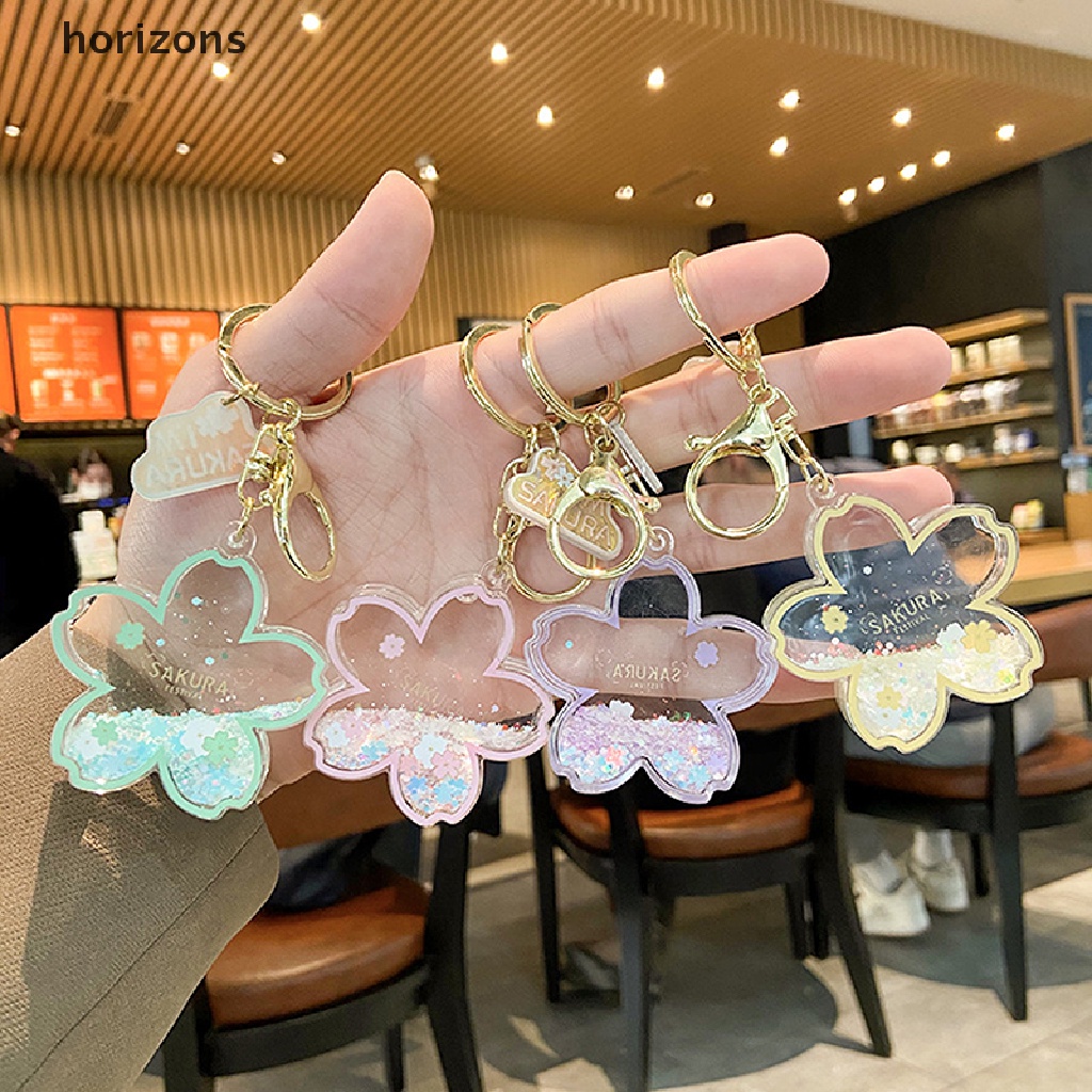 Móc khóa cặp đôi bằng acrylic hợp kim silicon cát chảy có hoa anh đào sáng tạo