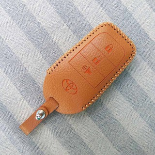 Bao da 3 nút chìa khóa smartkey xe hơi Toyota Fortuner (Nâu)