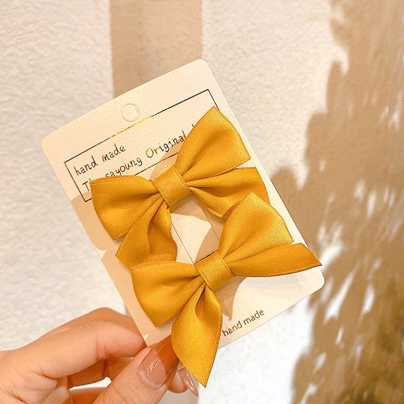 Kẹp tóc hình nơ cho bé gái điệu đà