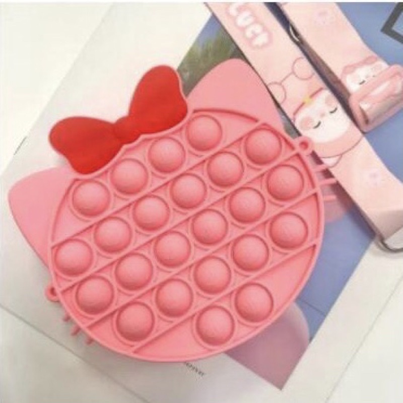 Túi đeo chéo nhỏ nhắn kiểu đồ chơi bấm bong bóng dễ thương cho trẻ em