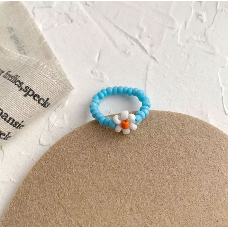 Nhẫn hạt cườm hình bông hoa