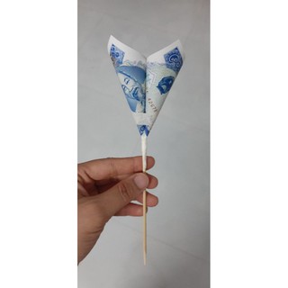 Que tre làm hoa tiền