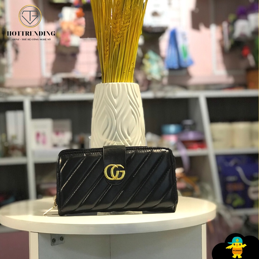 Ví Gucci cầm tay da mềm mại nhỏ ngọn dành cho những cô nàng thích hiện đại, trẻ trung ,sang cảnh