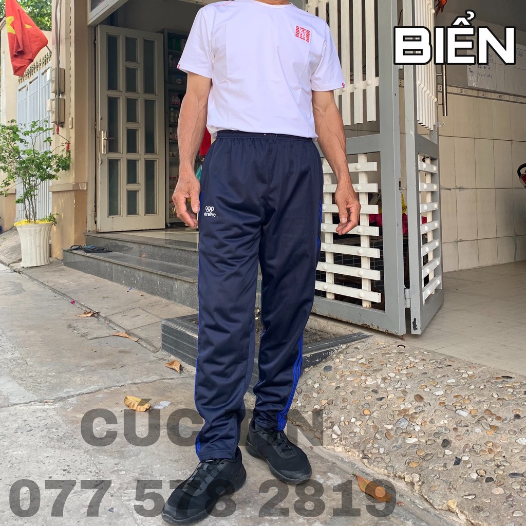QUẦN THỂ THAO DÀI, 3 SỌC, CÓ 2 TÚI KHÓA KÉO. CÚC TIN