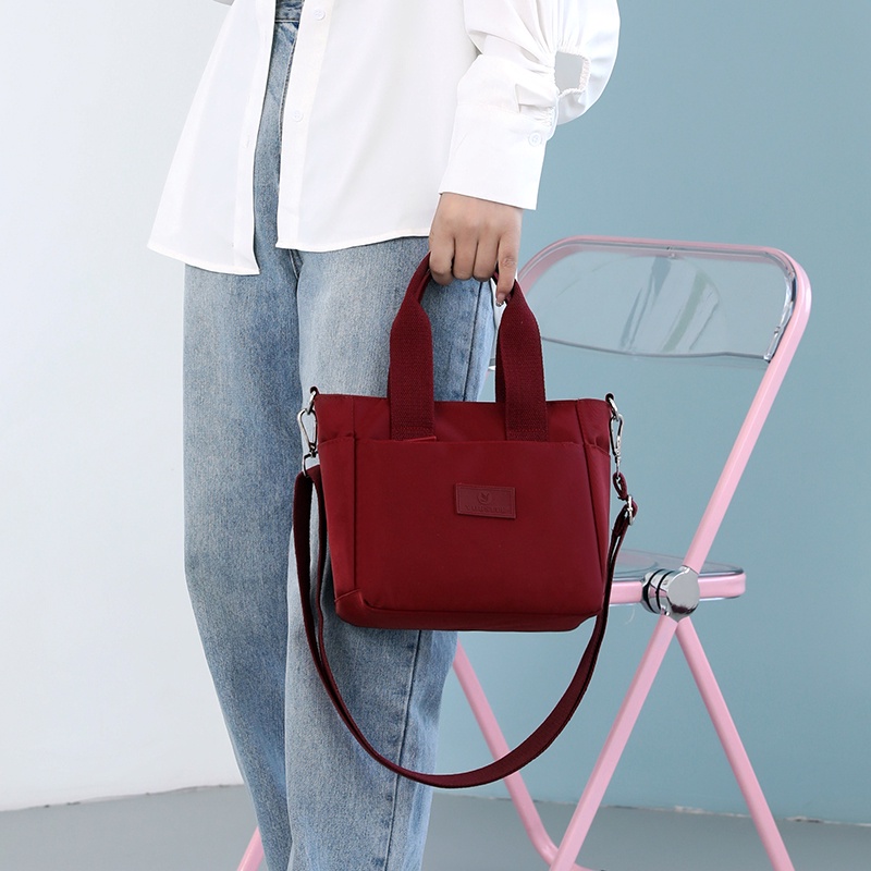 Túi Đeo Chéo Vai Bằng Vải Canvas Nylon Màu Trơn Siêu Nhẹ Kiểu Dáng Đơn Giản Dành Cho Nữ