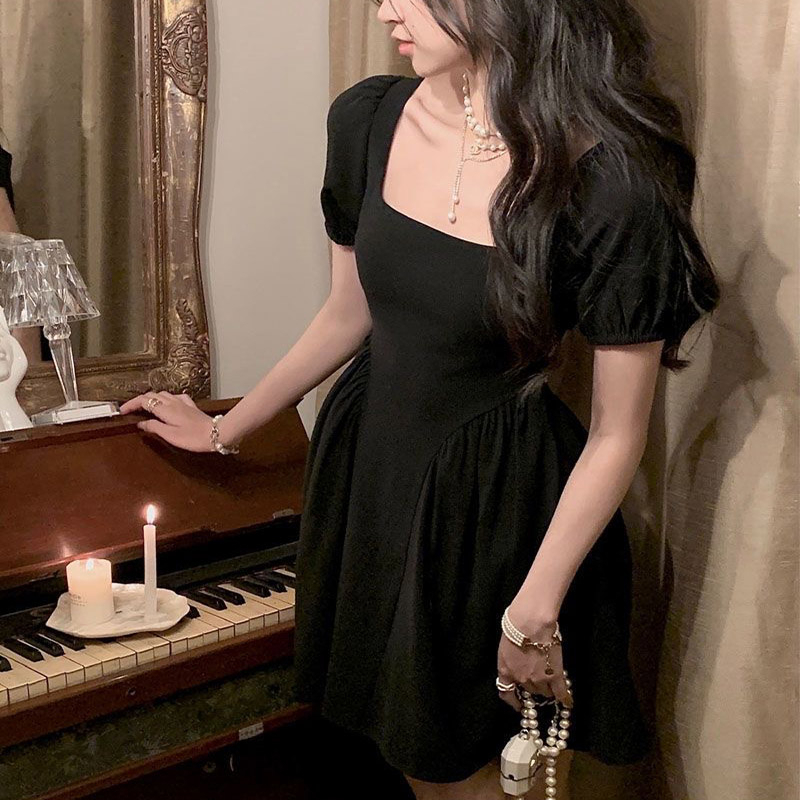 Đầm Đen Tay Phồng Hở Lưng Thắt Nơ Phong Cách Pháp Thời Trang Mùa Hè Cho Nữ