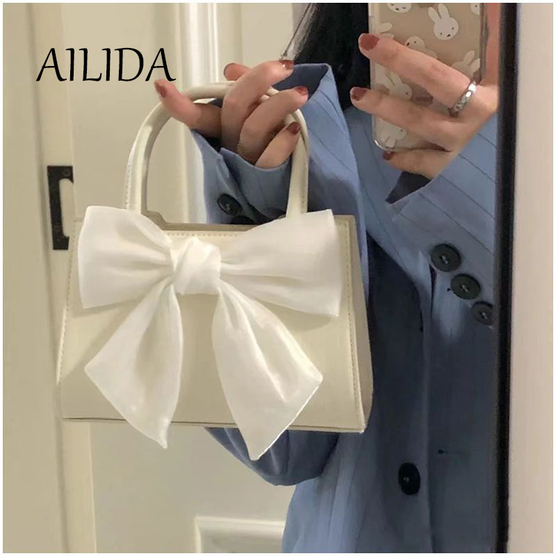 Túi Đeo Chéo Hình Vuông Nhỏ Đính Nơ Phong Cách Mới Cho Nữ