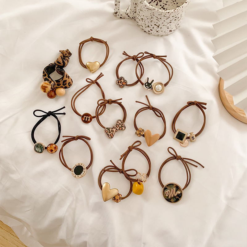 Set 10 Dây Buộc Tóc Cao Su In Họa Tiết Da Báo Đơn Giản Dành Cho Nữ