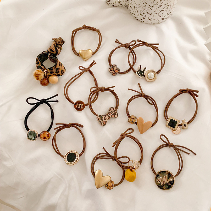 Set 10 Dây Buộc Tóc Cao Su In Họa Tiết Da Báo Đơn Giản Dành Cho Nữ