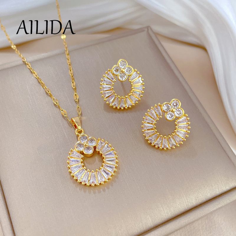 Bộ Dây Chuyền + Bông Tai + Nhẫn Bằng Thép Titan Hình Cỏ Ba Lá Dát Nhẹ Sang Trọng