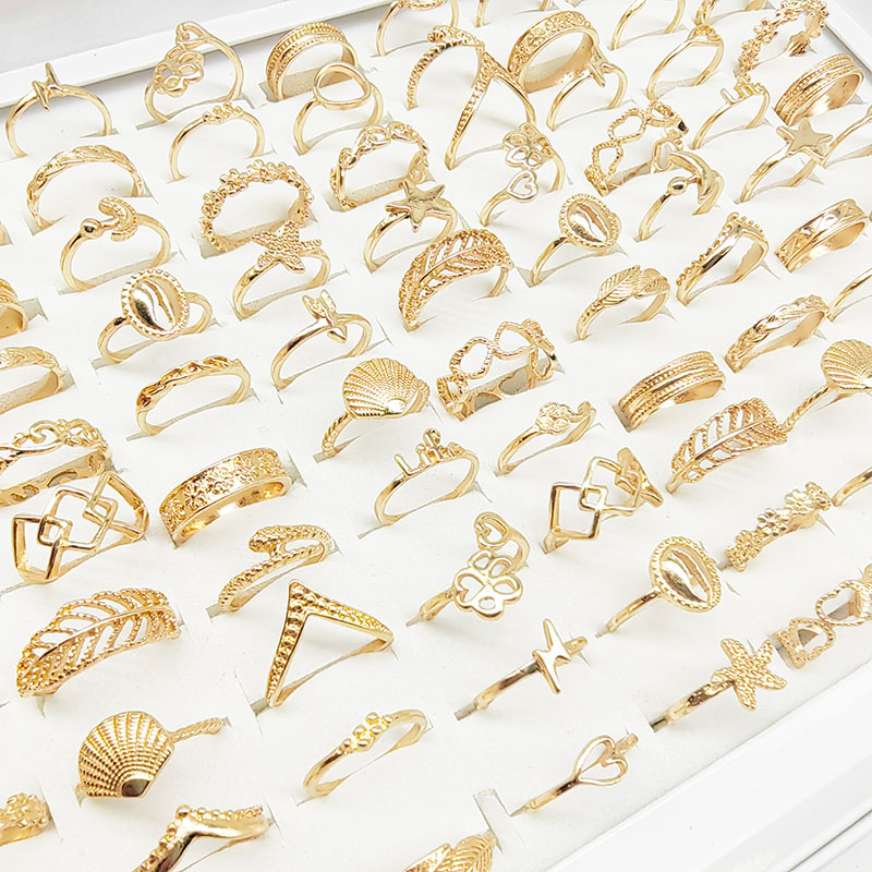 Bộ 30 Nhẫn Hình Sao Biển / Vỏ Sò / Hoa / Lá Rỗng Màu Vàng Thời Trang Cho Nữ