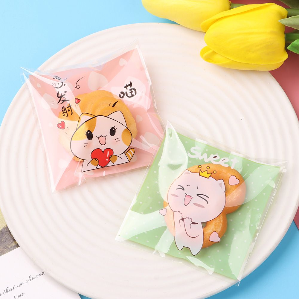 Set 100 Túi Nhựa Tự Dính In Họa Tiết Hoạt Hình Đựng Kẹo / Bánh Quy Kích Thước 7x7cm Trang Trí Tiệc Cướ