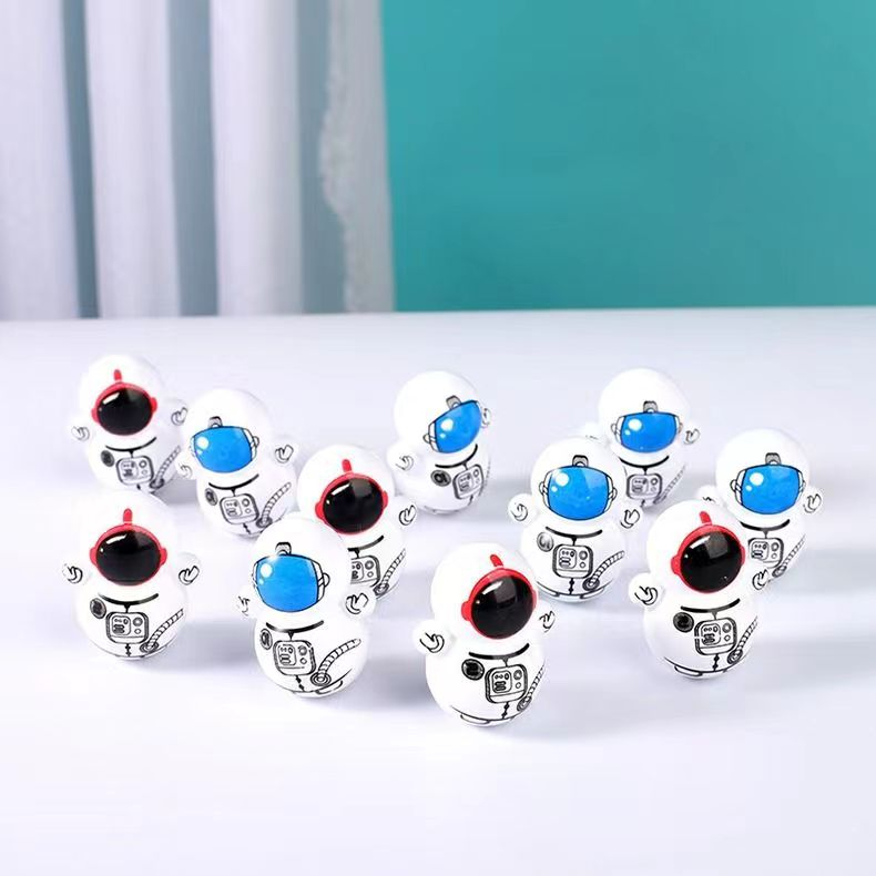 Đồ chơi lật đật giảm căng thẳng hình phi hành gia