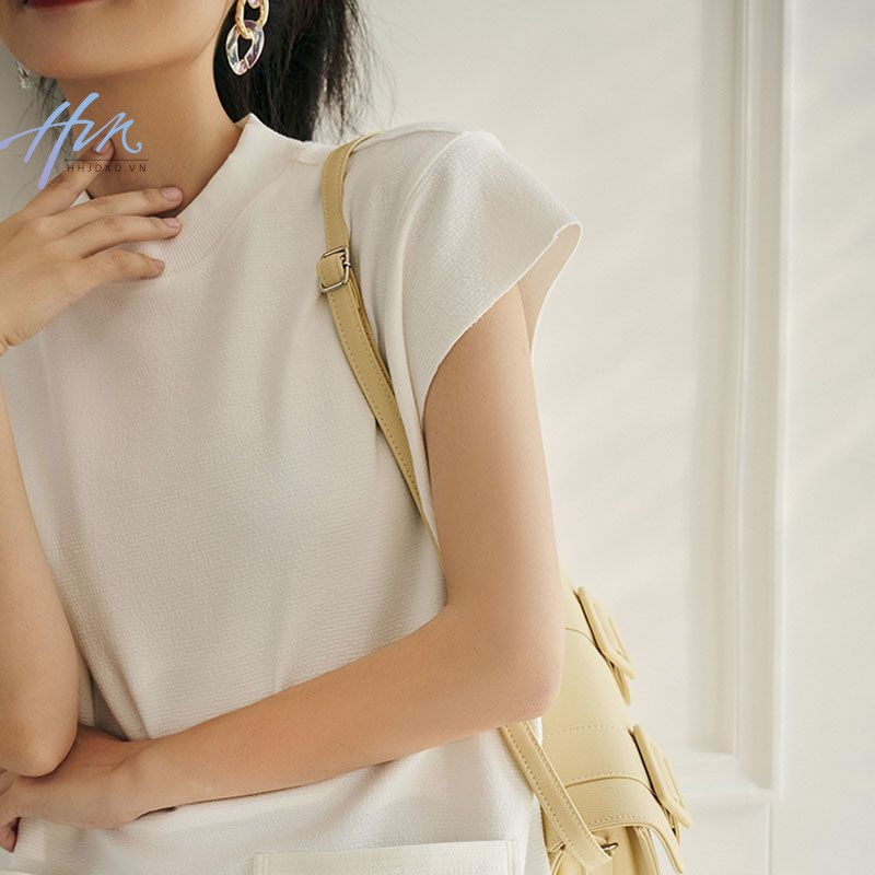 Đầm Thun Sát Nách Cổ Tròn Dáng Rộng Phối Túi Lớn Thời Trang Pháp Trẻ Trung