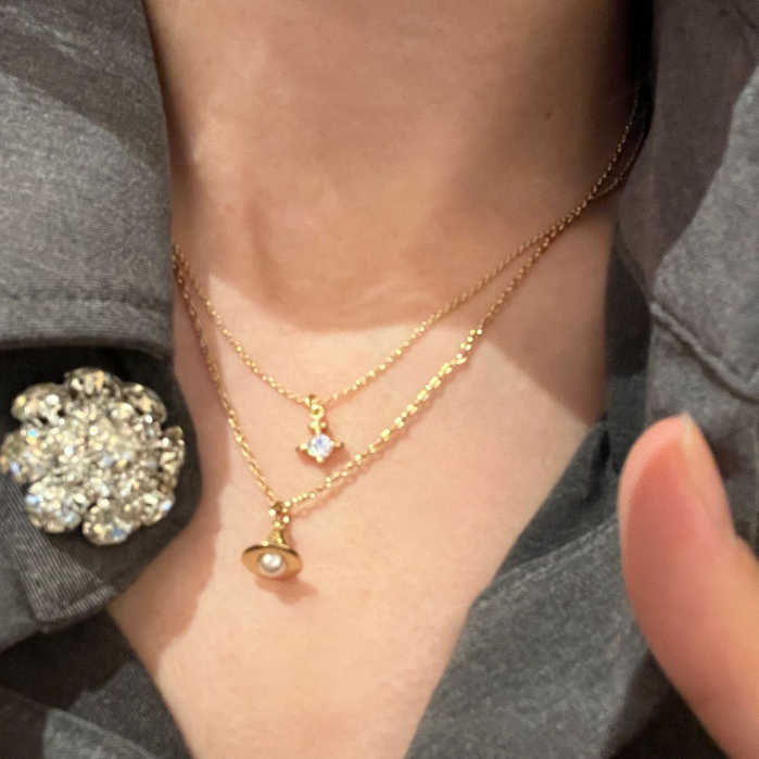 DÂY CHUYỀN VIVIENNE- WESTWOOD  925 Mặt Trái Tim Đính Đá Pha Lê Tím Phong Cách Mới Seiko WESTWOOD VIVIWEEN925