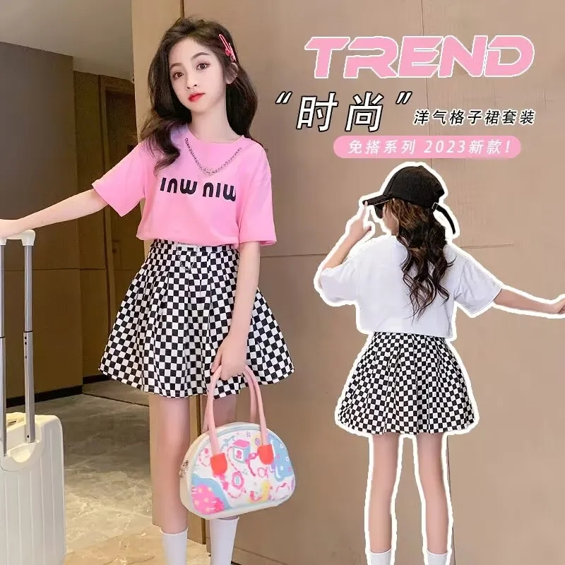 Set Áo Thun Ngắn Tay + Chân Váy Caro Trắng Đen Phong Cách Hàn Quốc Cho Bé Gái 3-14 Tuổi
