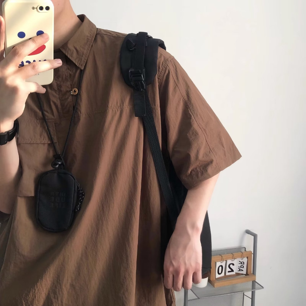 Áo Sơ Mi Tay Ngắn Dáng Rộng Màu Trơn Phối Túi Thời Trang Đường Phố Cá Tính Cho Nam áo sơ mi unisex nam áo sơ mi nâu