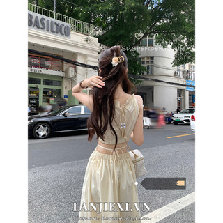 LANJIEXI Bên bờ biển thích hợp thiết kế cảm giác rỗng eo treo cổ treo đầm nữ mùa hè eo thon tua rua dài váy