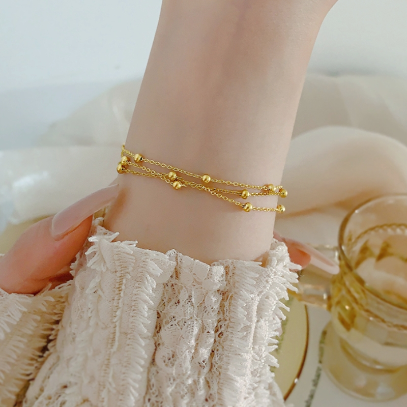 Lắc tay titan cao cấp không gỉ mạ vàng 24k thiết kế nhiều bi tròn thời trang thanh lịch tinh tế dành cho nữ