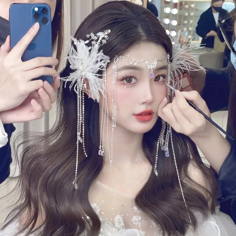 Set 2 kẹp tóc GETNOIVAS hình lông vũ lấp lánh thời trang cho nữ