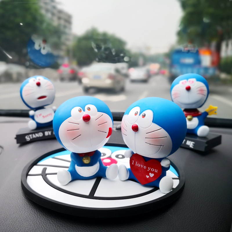 Mô Hình Nhân Vật Nobita Nobi Đầu Lắc Bằng PVC 12 Phong Cách 12cm Có Giá Đỡ Điện Thoại Trang Trí Xe Hơi