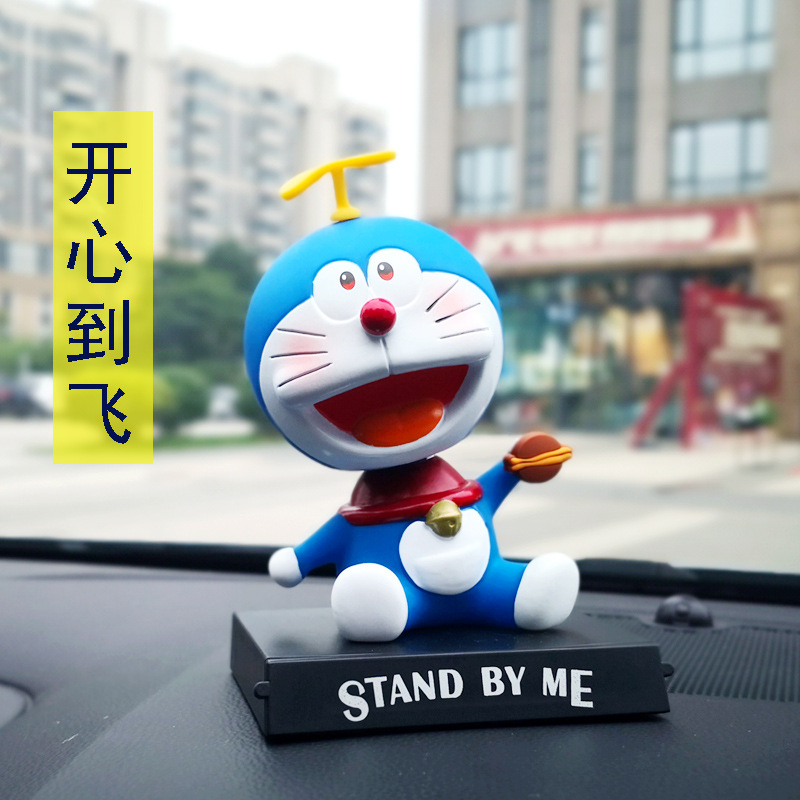 Mô Hình Nhân Vật Nobita Nobi Đầu Lắc Bằng PVC 12 Phong Cách 12cm Có Giá Đỡ Điện Thoại Trang Trí Xe Hơi