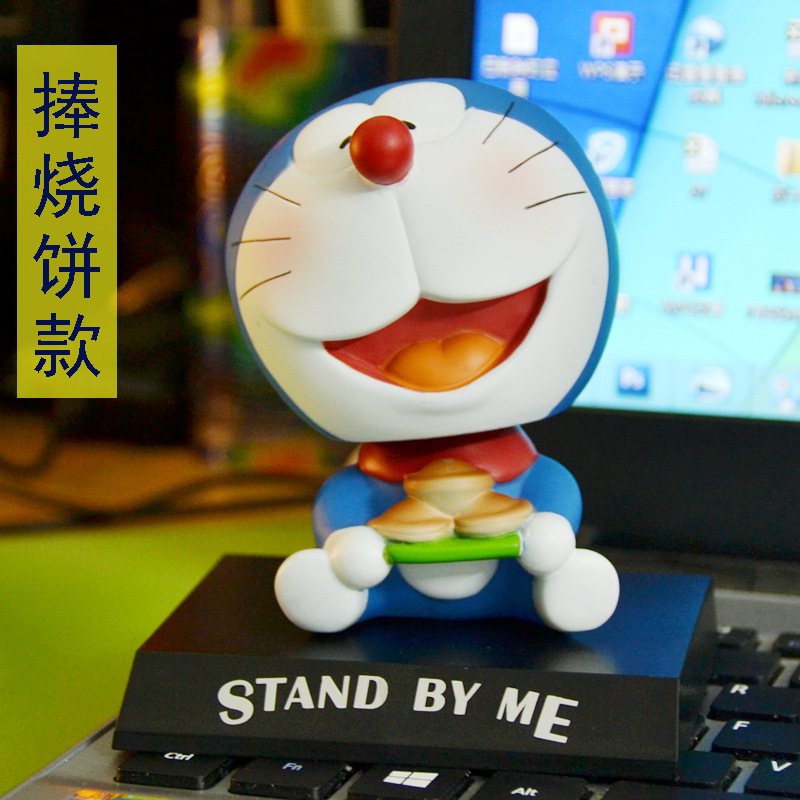 Mô Hình Nhân Vật Nobita Nobi Đầu Lắc Bằng PVC 12 Phong Cách 12cm Có Giá Đỡ Điện Thoại Trang Trí Xe Hơi