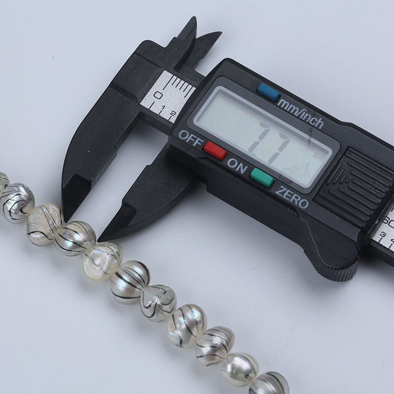 Cuộn Dây Ngọc Trai Tự Nhiên Dài 18cm Dài 7-8mm Màu Sắc